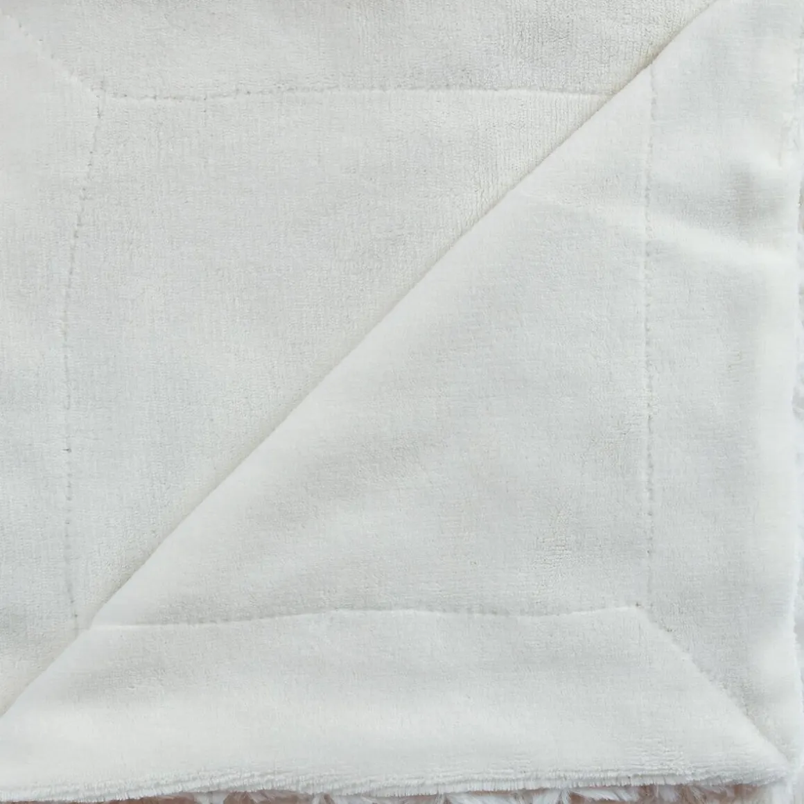 Plaid "Bouclette" fausse fourrure