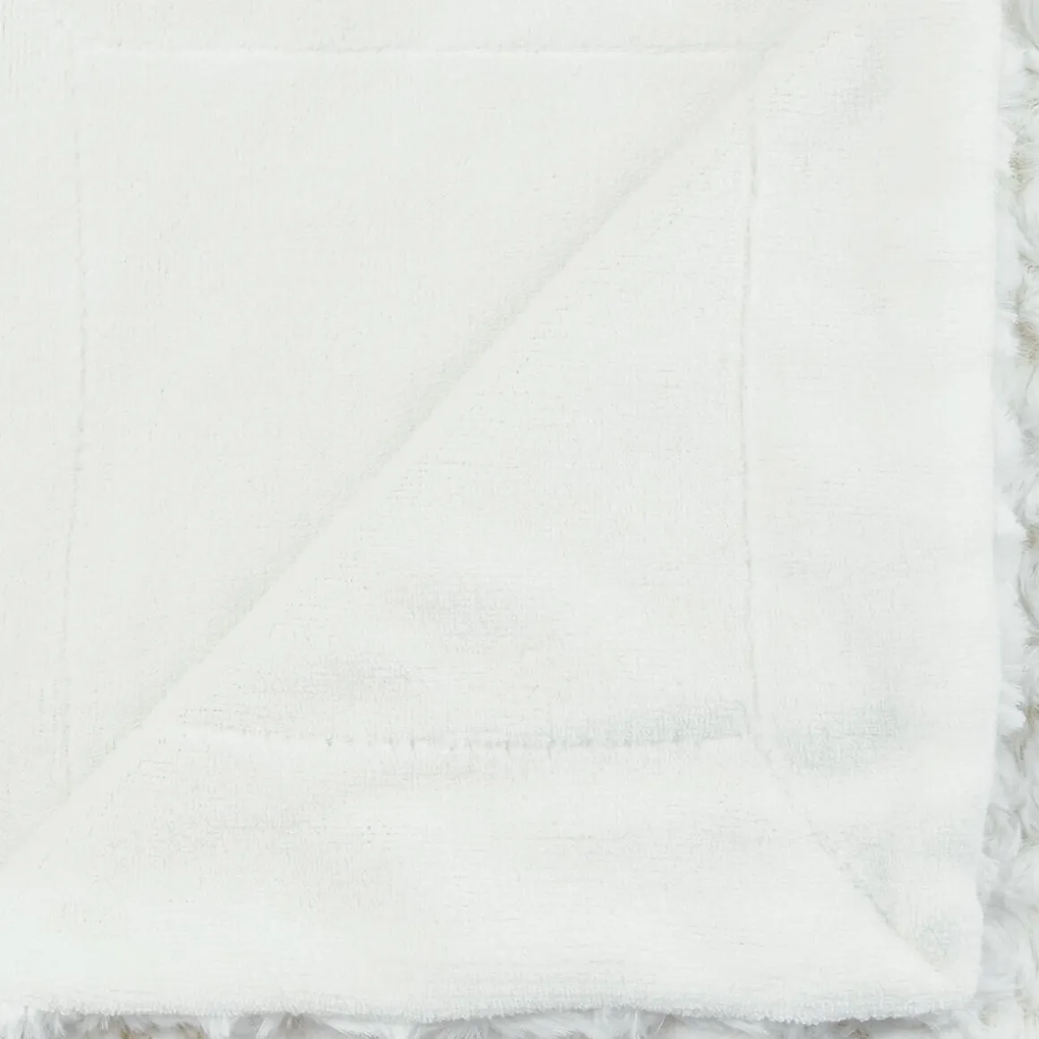 Plaid "Bouclette" fausse fourrure